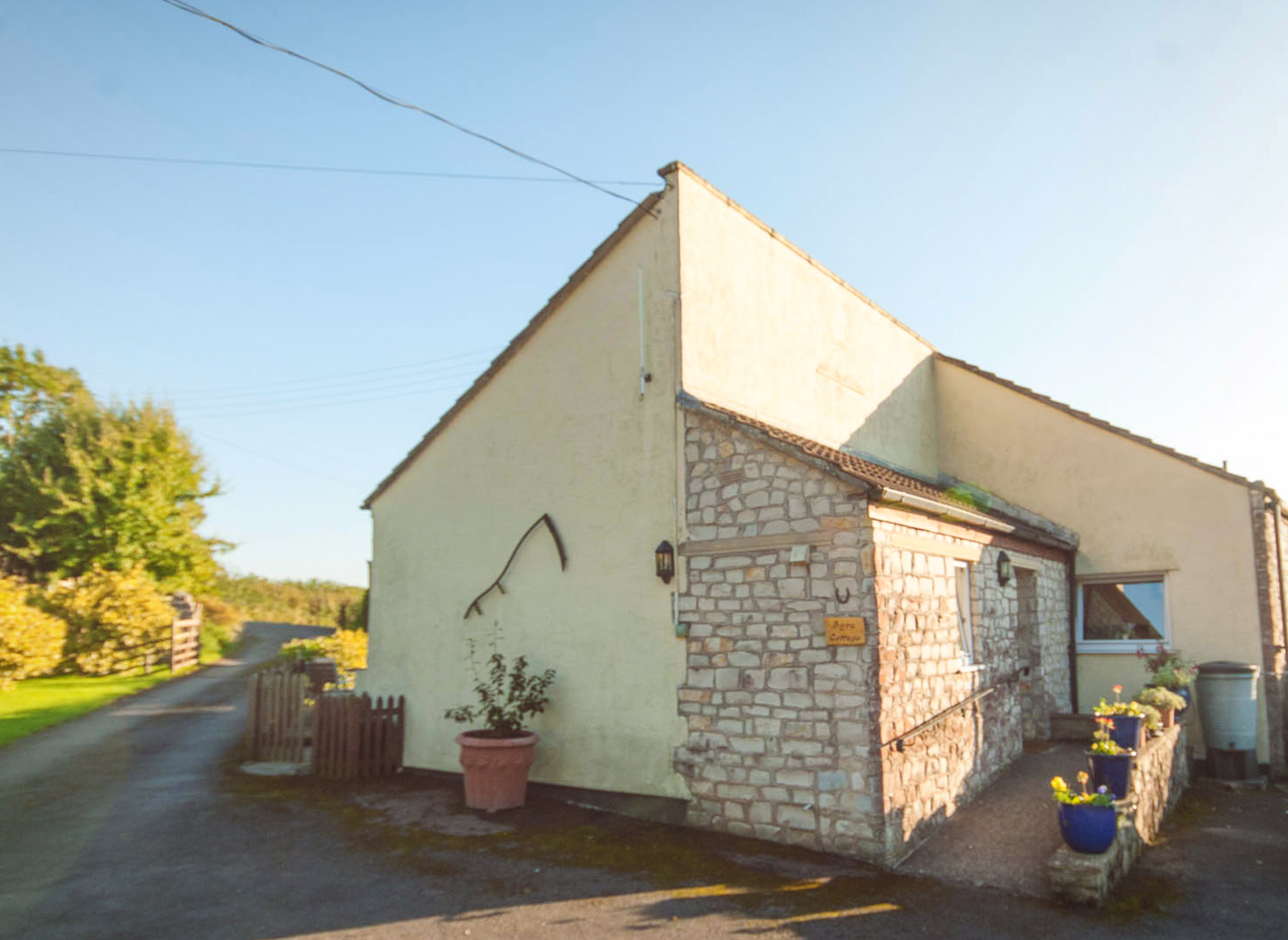 Entrance to Byre Cottage showing the slope to the front door.